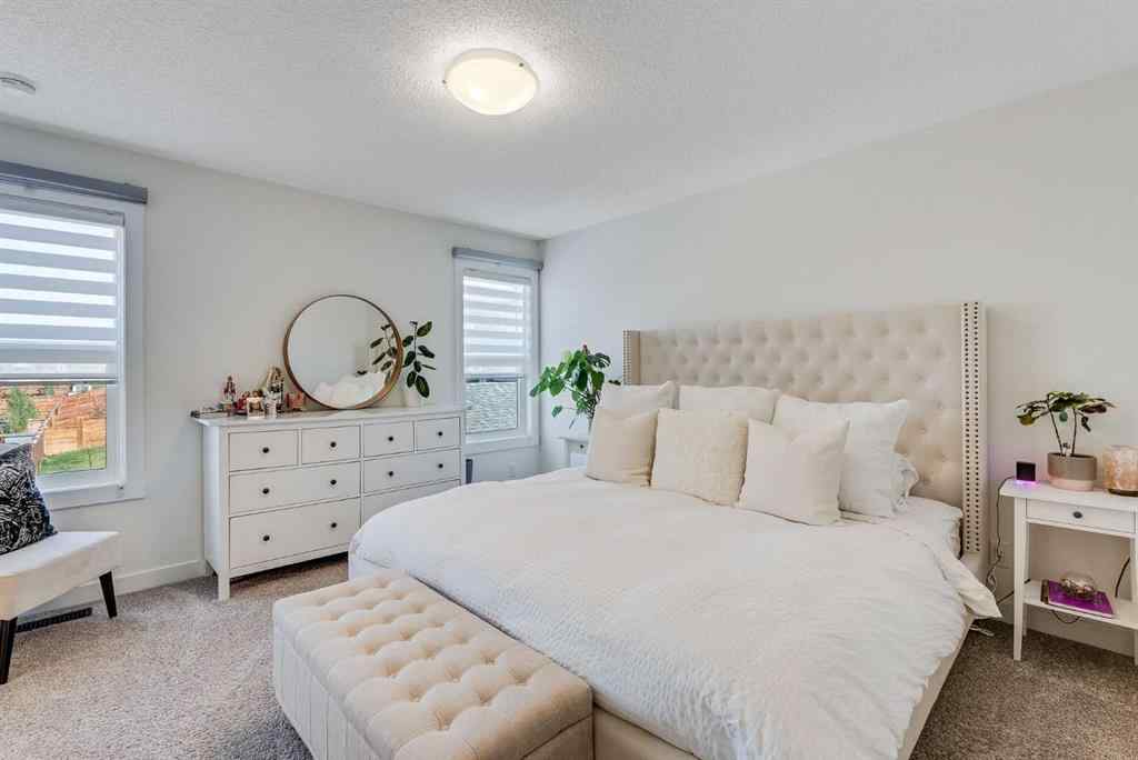 MLS® A2257503 - 145 Lucas Crescent NW in Livingston Calgary, Residential