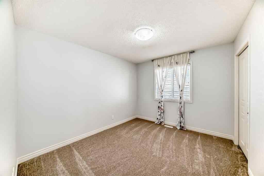 MLS® A2257513 - 410 Panatella Square NW in Panorama Hills Calgary, Residential