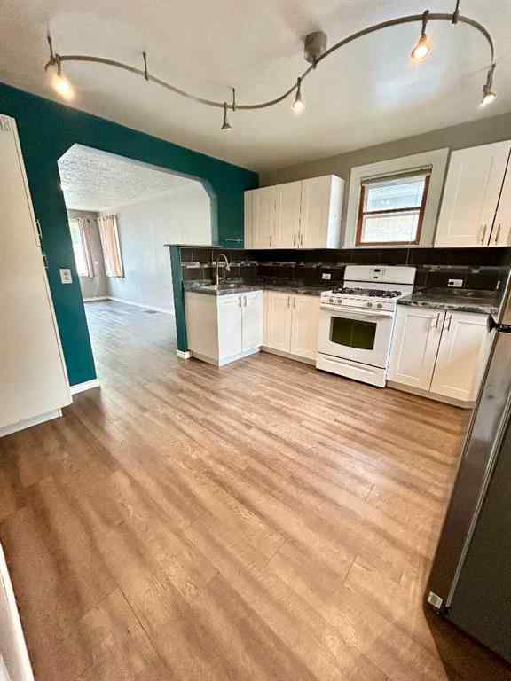 MLS® A2257515 - 1214 9 Avenue N in Senator Buchanan Lethbridge, Residential