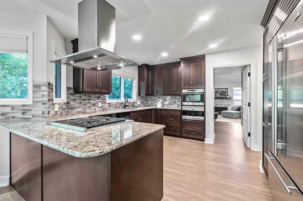 MLS® A2257520 - 108 Canterville Road SW in Canyon Meadows Calgary, Residential