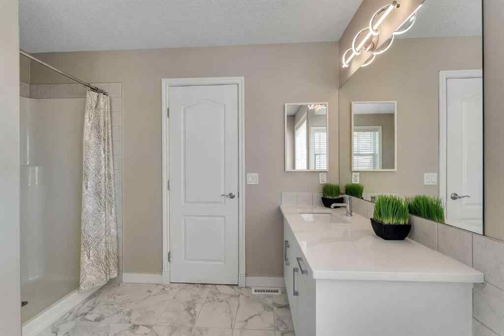 MLS® A2257521 - 209 Sagewood Grove SW in Sagewood Airdrie, Residential