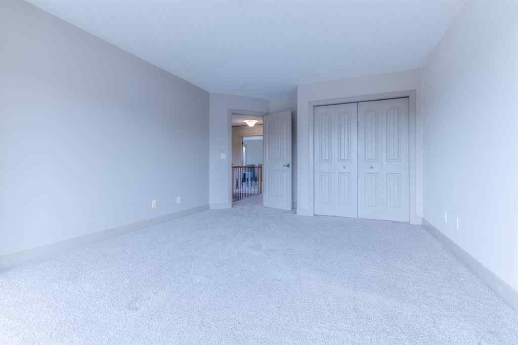 MLS® A2257526 - 52 Elmont Green SW in Springbank Hill Calgary, Residential
