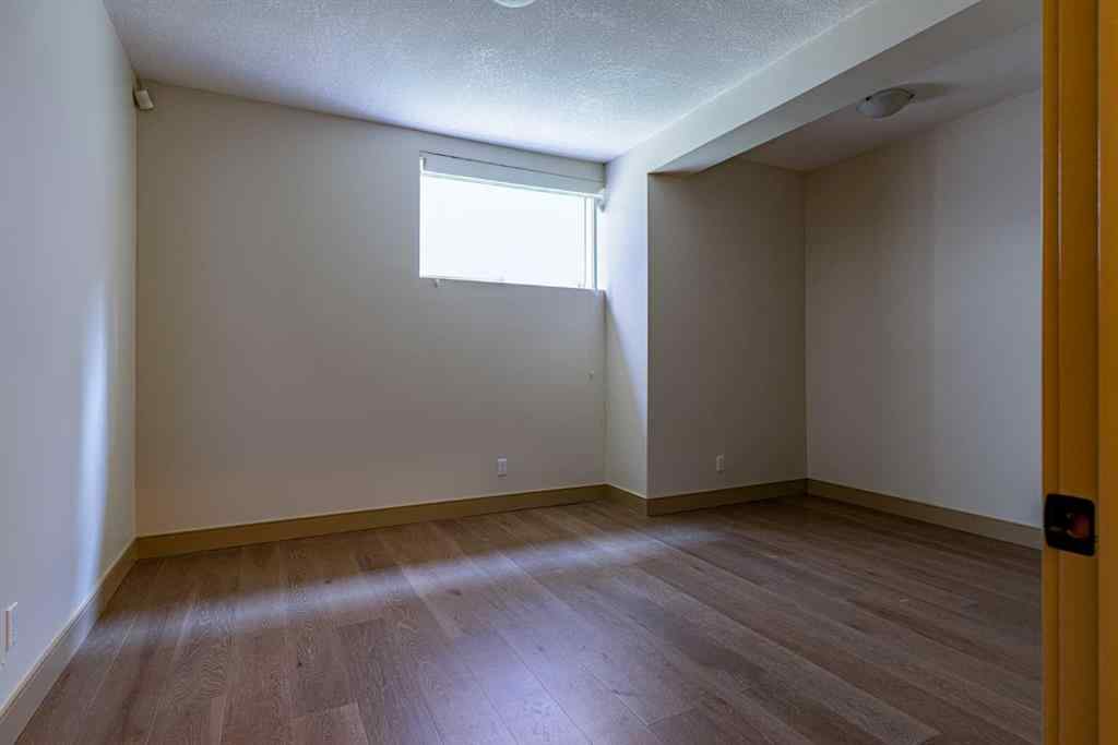 MLS® A2257526 - 52 Elmont Green SW in Springbank Hill Calgary, Residential
