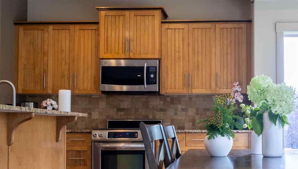 MLS® A2257526 - 52 Elmont Green SW in Springbank Hill Calgary, Residential