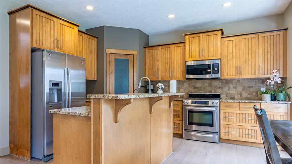 MLS® A2257526 - 52 Elmont Green SW in Springbank Hill Calgary, Residential