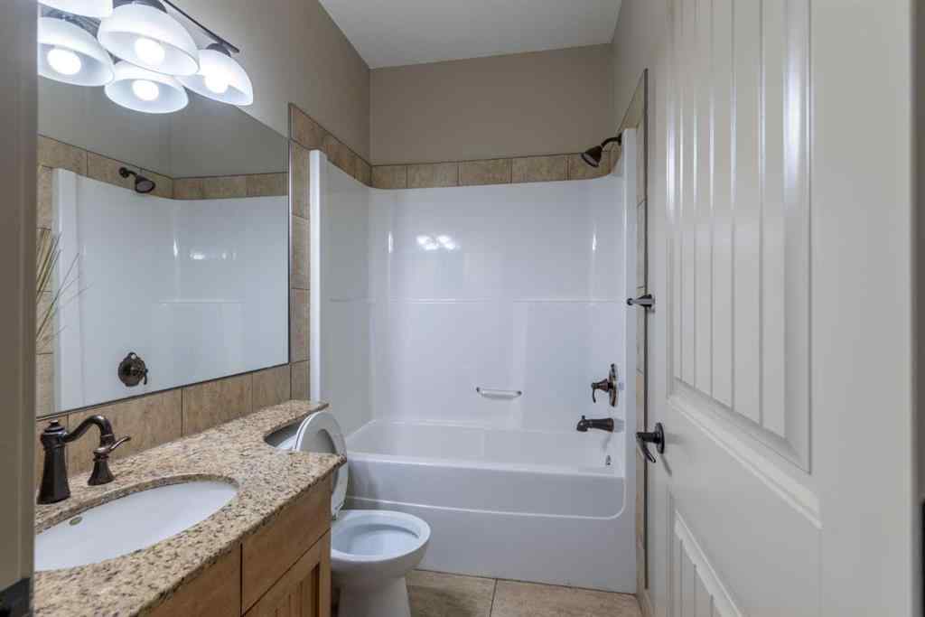 MLS® A2257526 - 52 Elmont Green SW in Springbank Hill Calgary, Residential