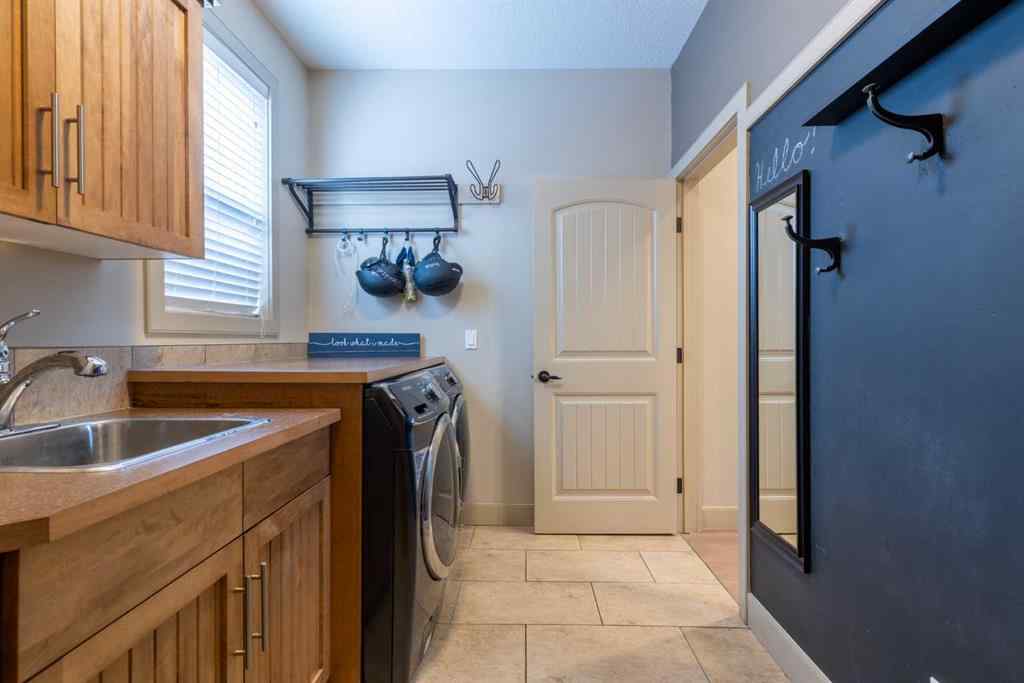 MLS® A2257526 - 52 Elmont Green SW in Springbank Hill Calgary, Residential