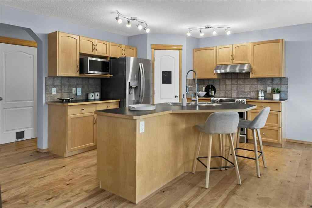 MLS® A2257540 - 172 Tuscany Meadows Heath NW in Tuscany Calgary, Residential