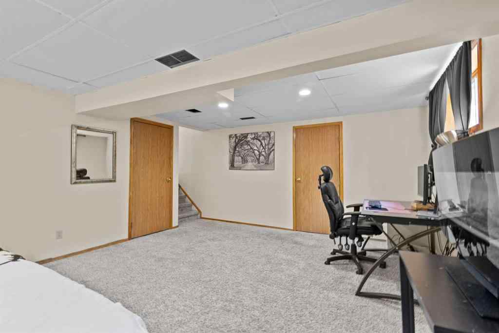 MLS® A2257552 - 131 Stratton Crescent SW in Strathcona Park Calgary, Residential