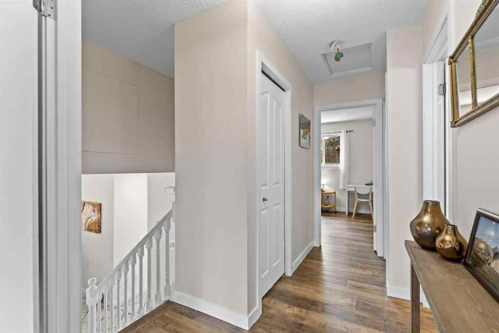 MLS® A2257552 - 131 Stratton Crescent SW in Strathcona Park Calgary, Residential
