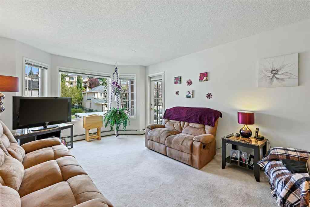 MLS® A2257553 - Unit #1206 1000 Sienna Park Green SW in Signal Hill Calgary, Residential