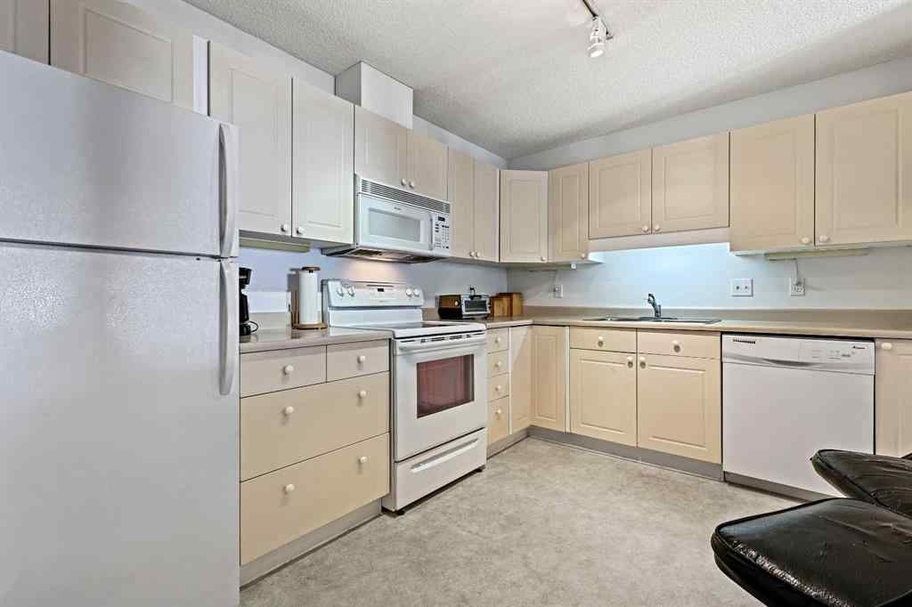 MLS® A2257553 - Unit #1206 1000 Sienna Park Green SW in Signal Hill Calgary, Residential