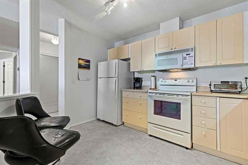 MLS® A2257553 - Unit #1206 1000 Sienna Park Green SW in Signal Hill Calgary, Residential