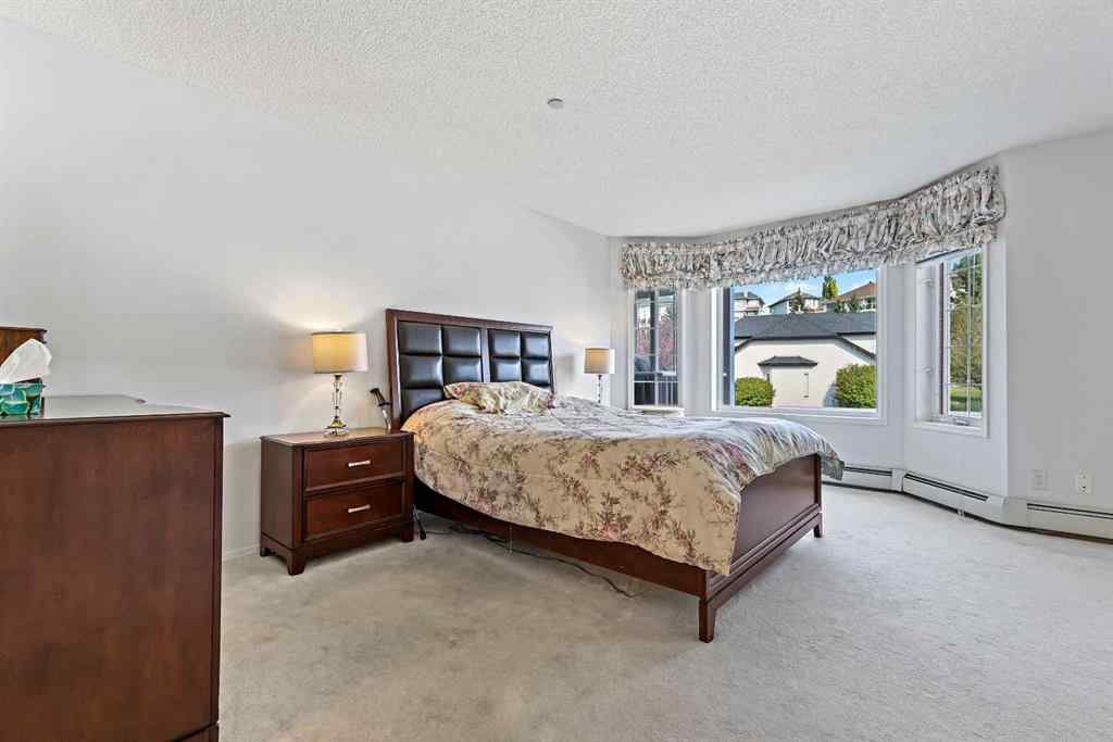 MLS® A2257553 - Unit #1206 1000 Sienna Park Green SW in Signal Hill Calgary, Residential