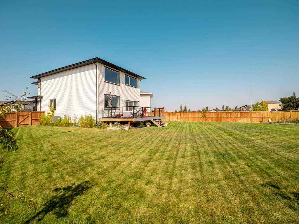 MLS® A2257560 - 57 Goldenrod Place W in Country Meadows Estates Lethbridge, Residential