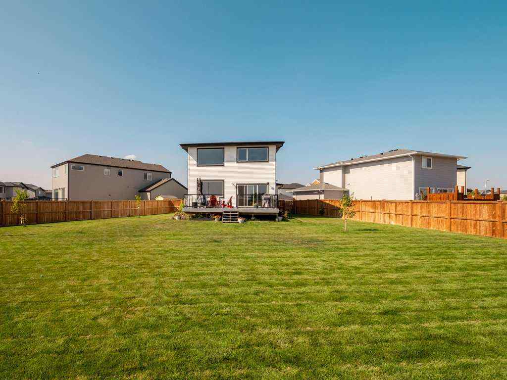 MLS® A2257560 - 57 Goldenrod Place W in Country Meadows Estates Lethbridge, Residential