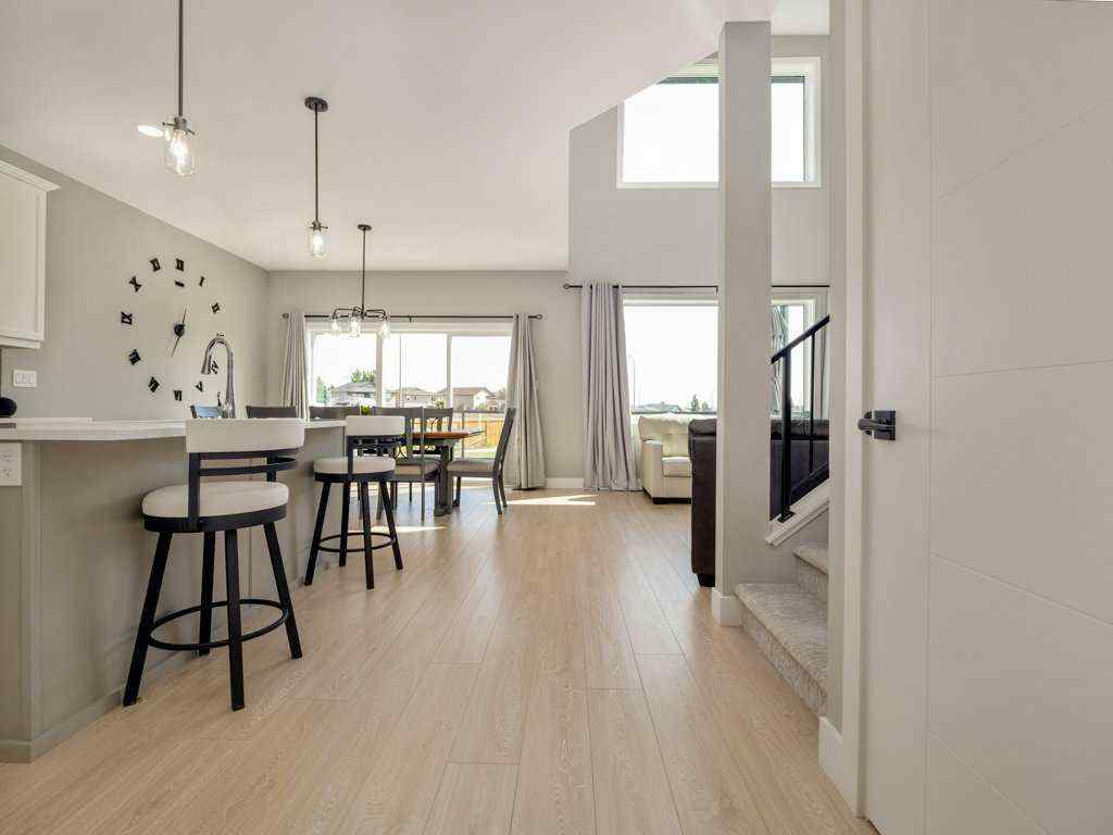 MLS® A2257560 - 57 Goldenrod Place W in Country Meadows Estates Lethbridge, Residential