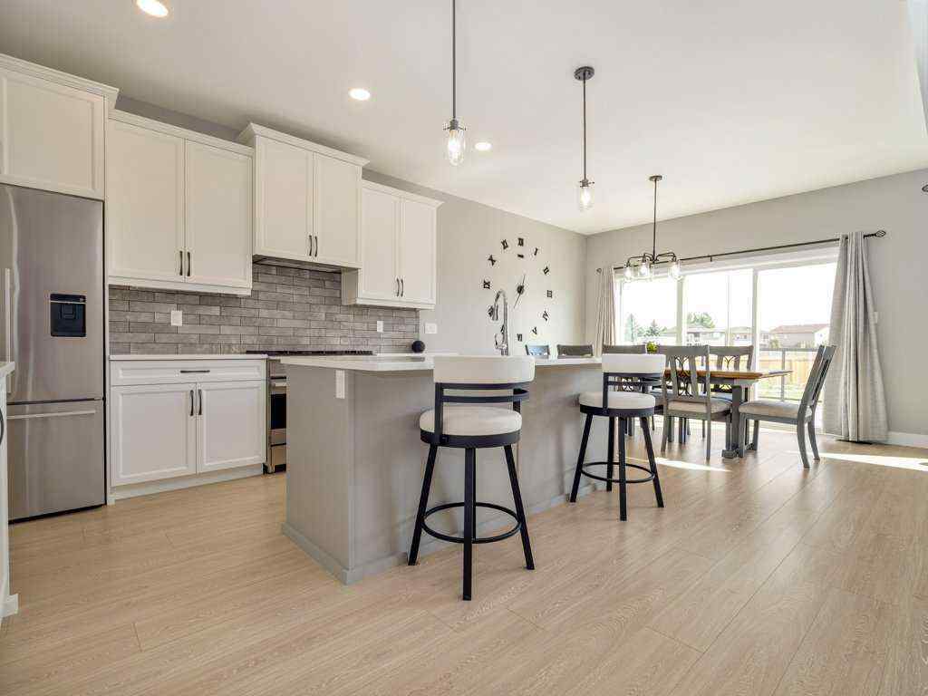 MLS® A2257560 - 57 Goldenrod Place W in Country Meadows Estates Lethbridge, Residential