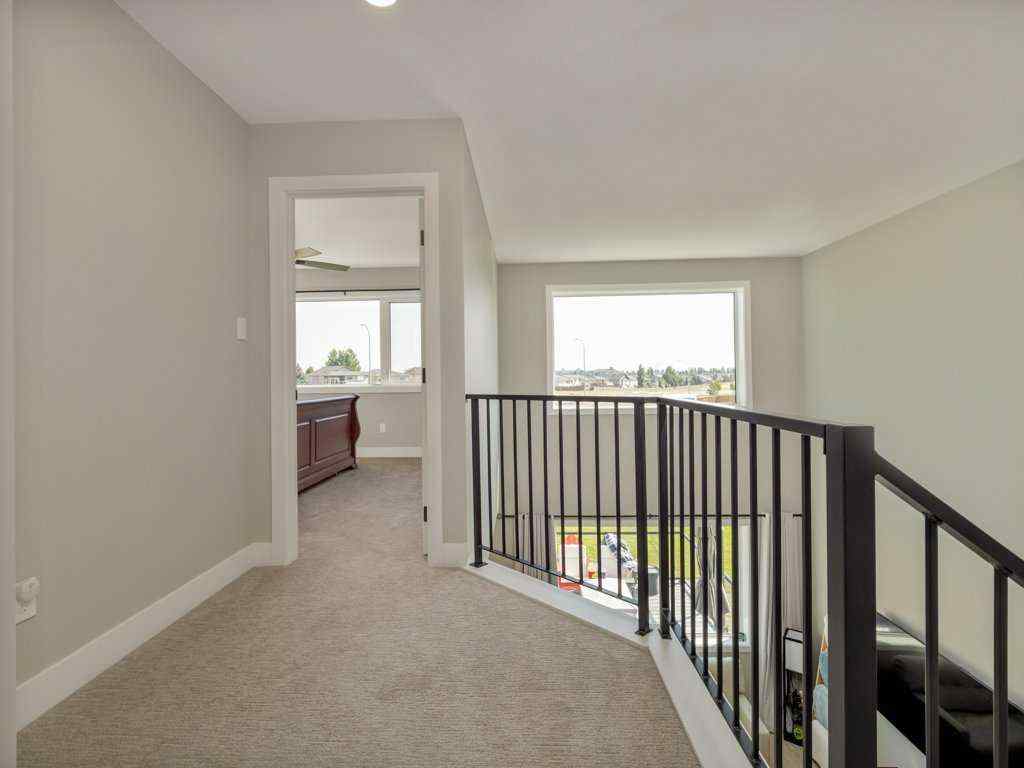 MLS® A2257560 - 57 Goldenrod Place W in Country Meadows Estates Lethbridge, Residential