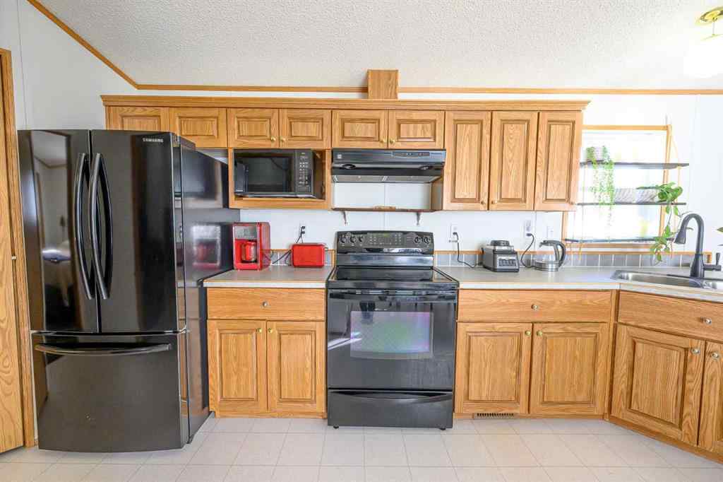 MLS® A2257561 - 126 Clark Crescent  in MH - Silver Pointe Rural Grande Prairie No. 1, County of, Mobile