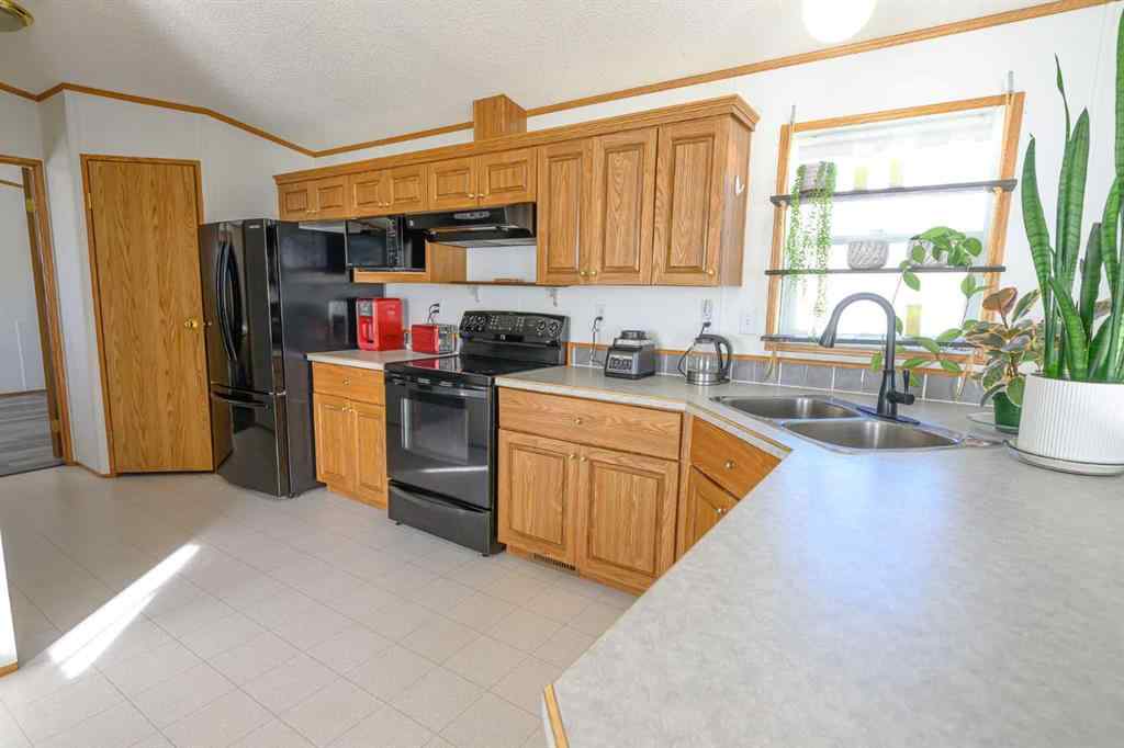 MLS® A2257561 - 126 Clark Crescent  in MH - Silver Pointe Rural Grande Prairie No. 1, County of, Mobile