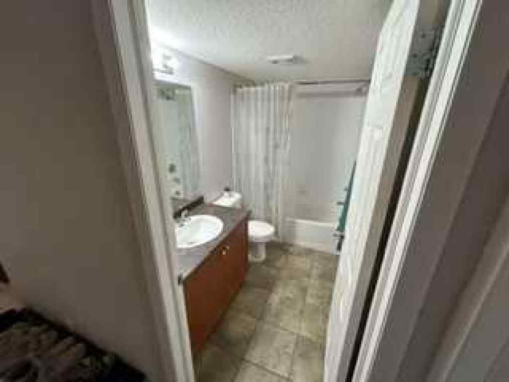 MLS® A2257580 - Unit #2118 505 Railway Street W in Downtown Cochrane, Residential