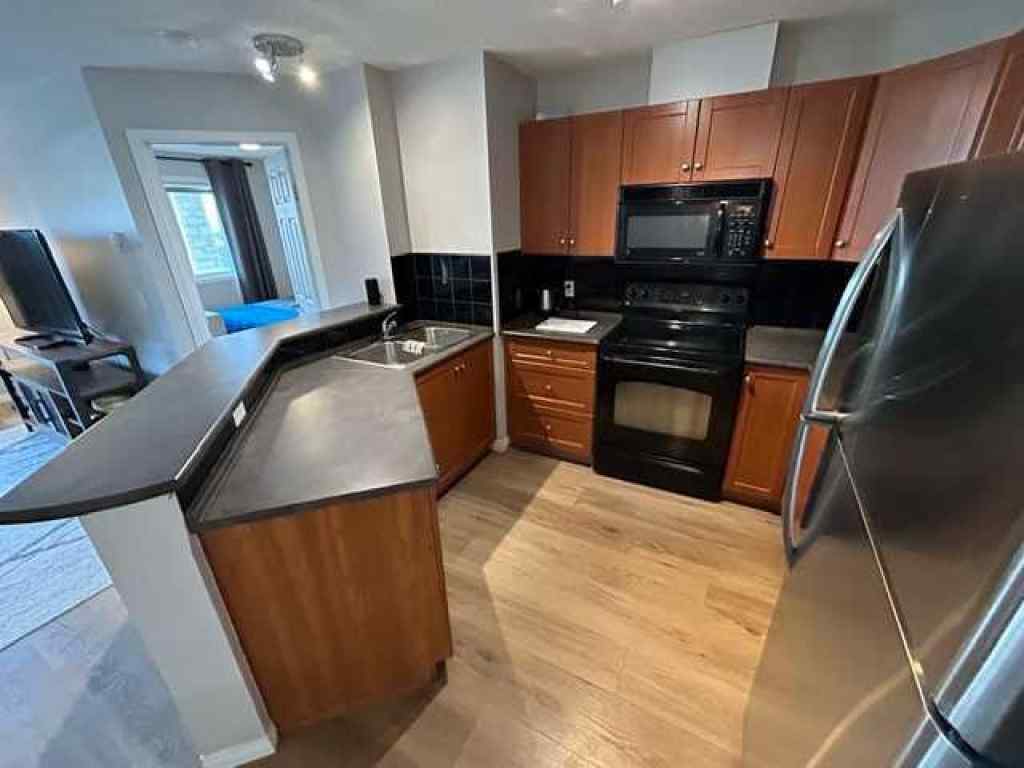 MLS® A2257580 - Unit #2118 505 Railway Street W in Downtown Cochrane, Residential