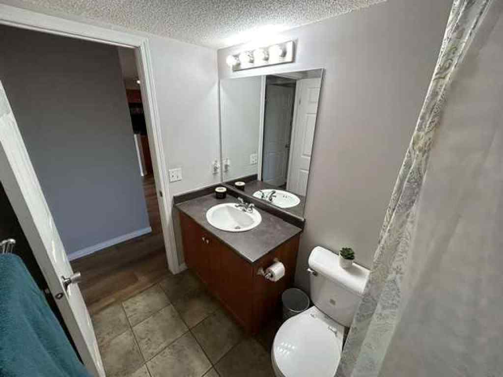 MLS® A2257580 - Unit #2118 505 Railway Street W in Downtown Cochrane, Residential