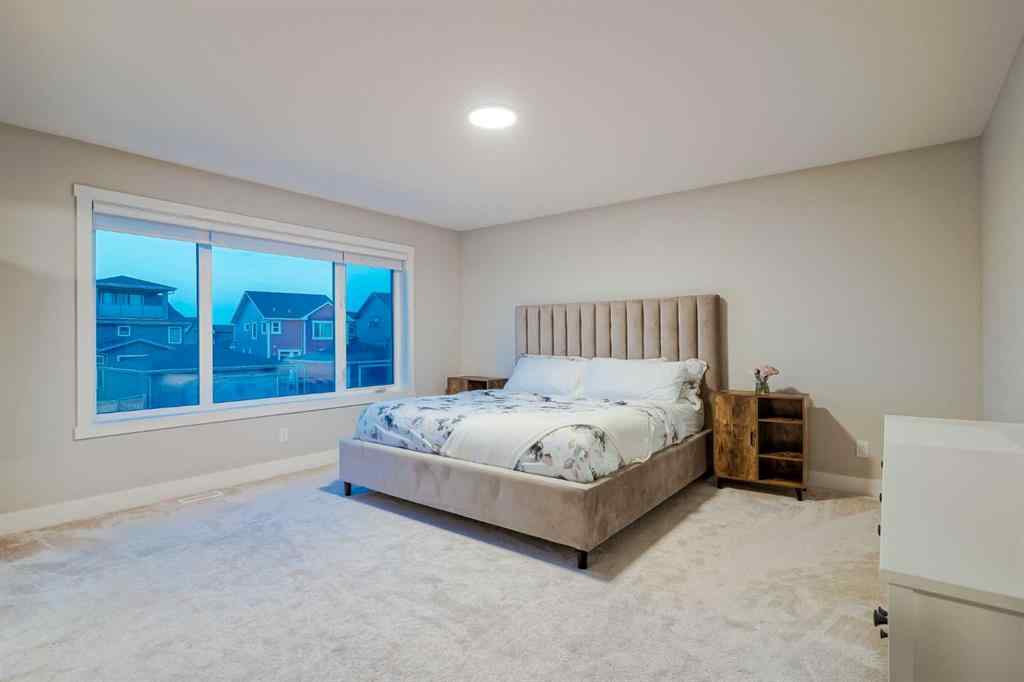 MLS® A2257582 - 105 Chokecherry Ridge  in Harmony Rural Rocky View County, Residential