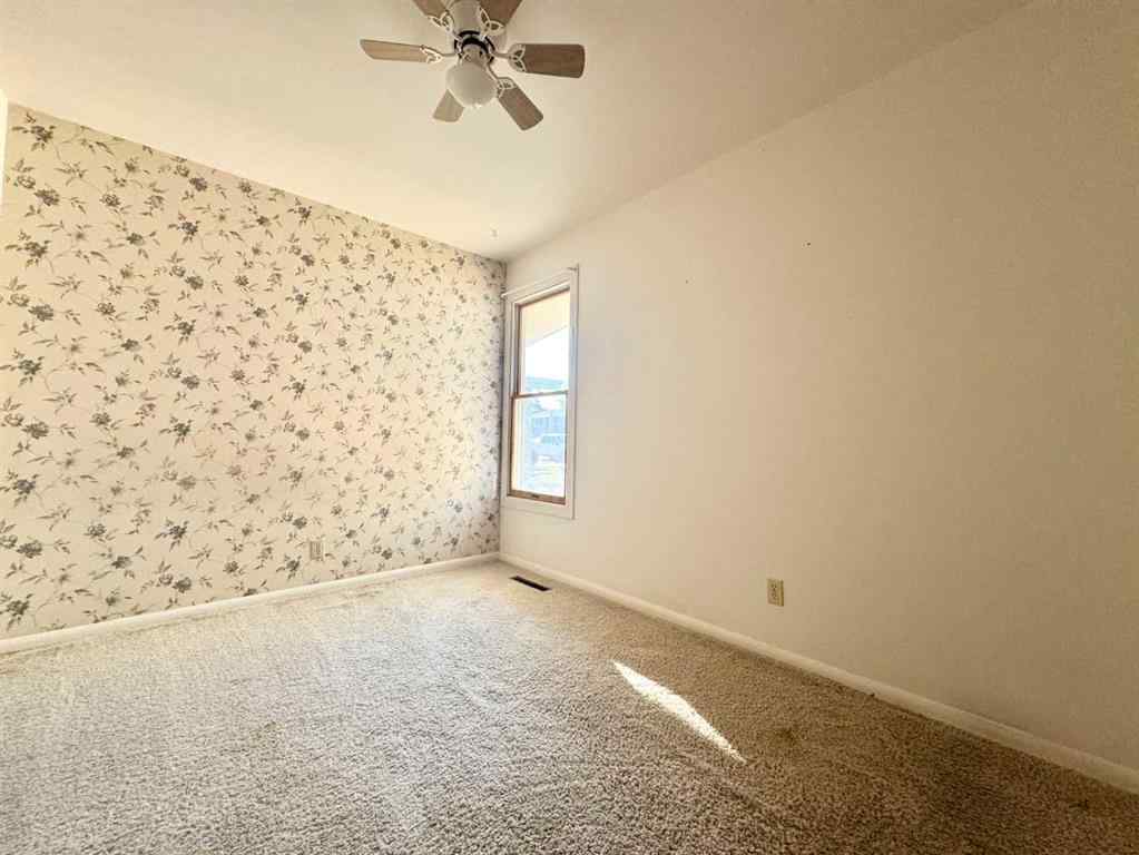 MLS® A2257587 - 809 11 Avenue S in Fleetwood Lethbridge, Residential