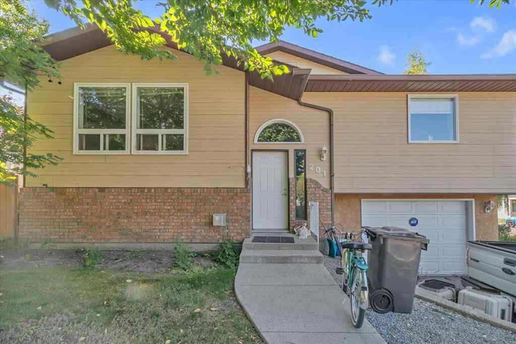 MLS&reg; # A2257605 - 201 4 Avenue SE in Downtown High River High River, Residential Open Houses