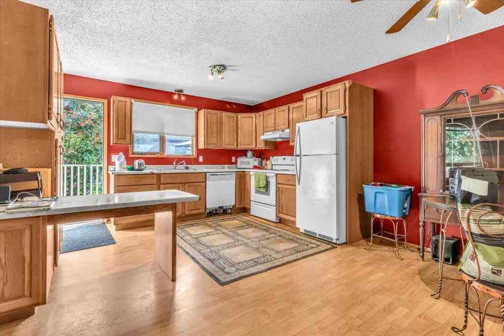 MLS&reg; # A2257605 - 201 4 Avenue SE in Downtown High River High River, Residential Open Houses