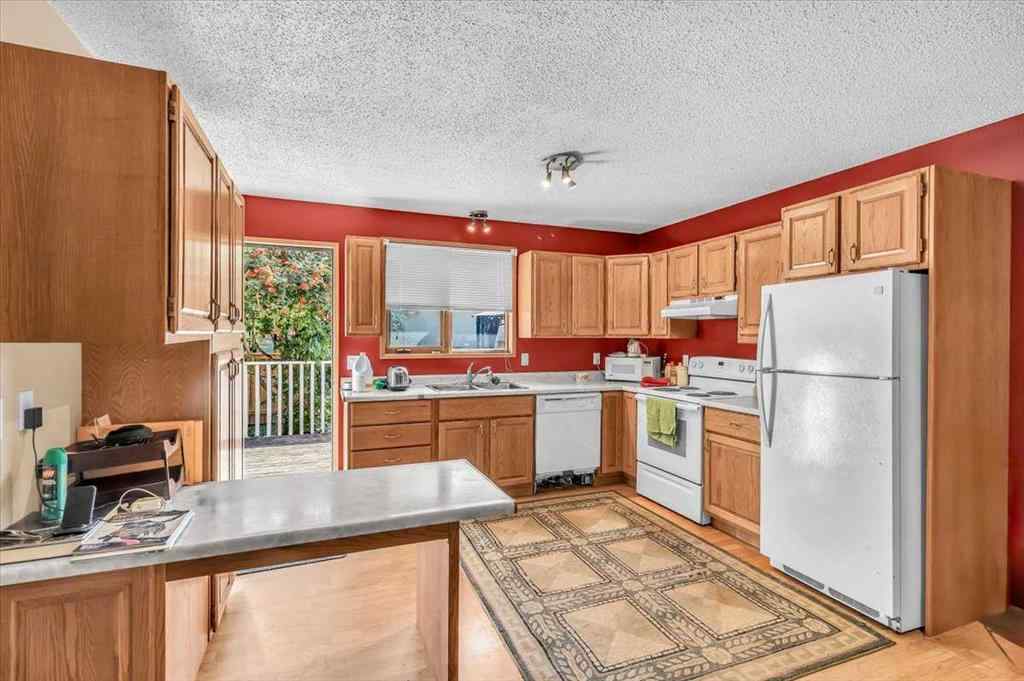 MLS&reg; # A2257605 - 201 4 Avenue SE in Downtown High River High River, Residential Open Houses