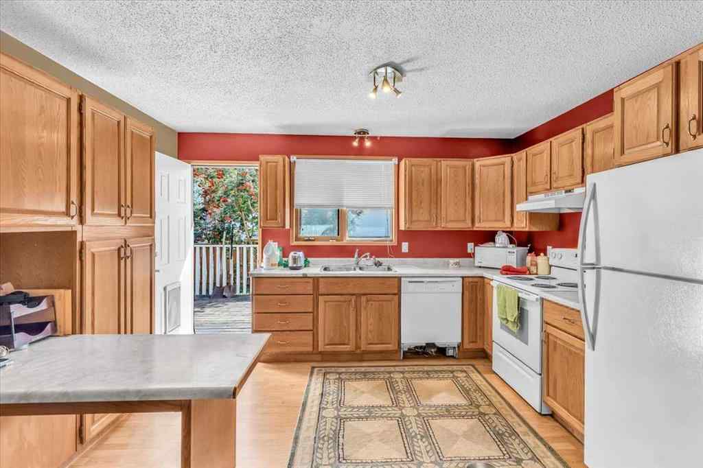 MLS&reg; # A2257605 - 201 4 Avenue SE in Downtown High River High River, Residential Open Houses