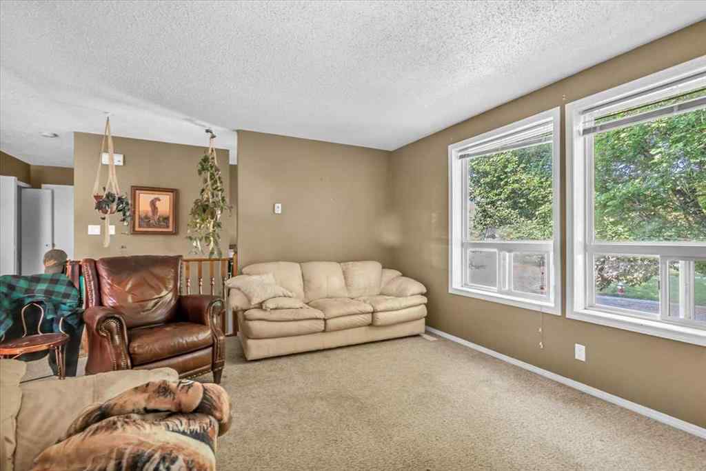 MLS&reg; # A2257605 - 201 4 Avenue SE in Downtown High River High River, Residential Open Houses