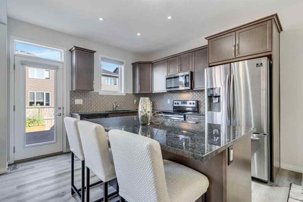 MLS® A2257628 - 418 Windrow Common SW in South Windsong Airdrie, Residential