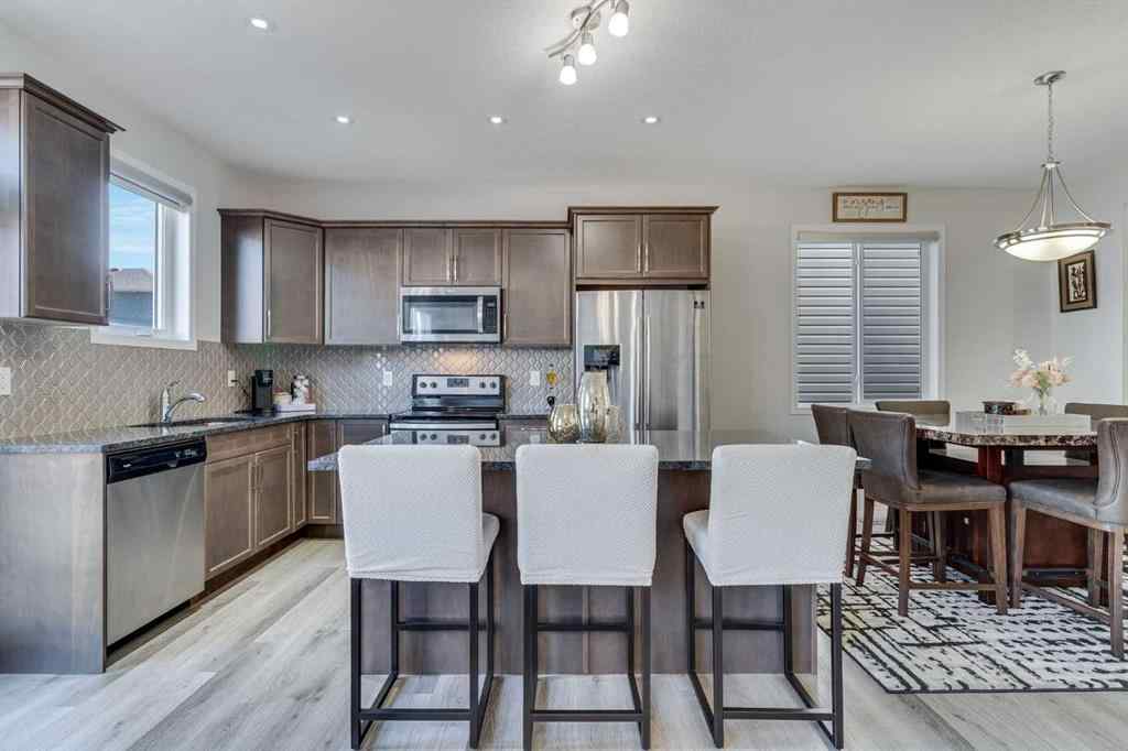 MLS® A2257628 - 418 Windrow Common SW in South Windsong Airdrie, Residential