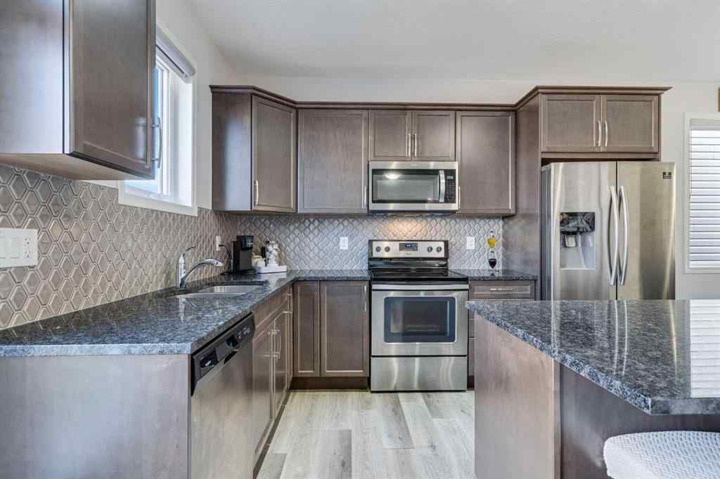 MLS® A2257628 - 418 Windrow Common SW in South Windsong Airdrie, Residential