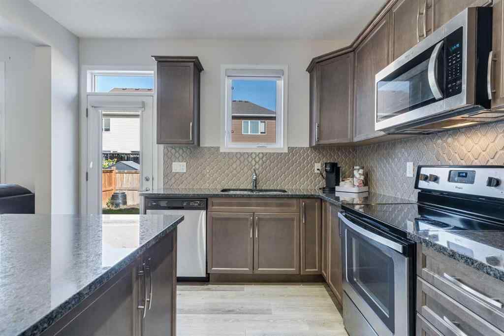 MLS® A2257628 - 418 Windrow Common SW in South Windsong Airdrie, Residential