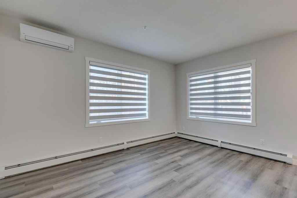MLS® A2257634 - Unit #113 55 Wolf Hollow Crescent SE in Wolf Willow Calgary, Residential