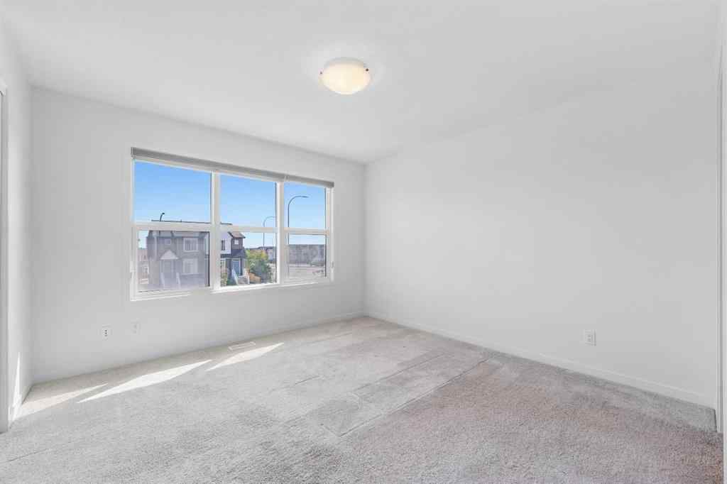 MLS® A2257638 - 21 Edith Gate NW in Glacier Ridge Calgary, Residential