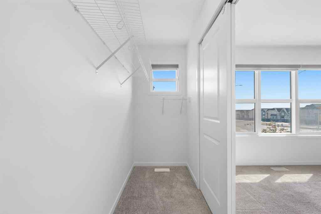 MLS® A2257638 - 21 Edith Gate NW in Glacier Ridge Calgary, Residential