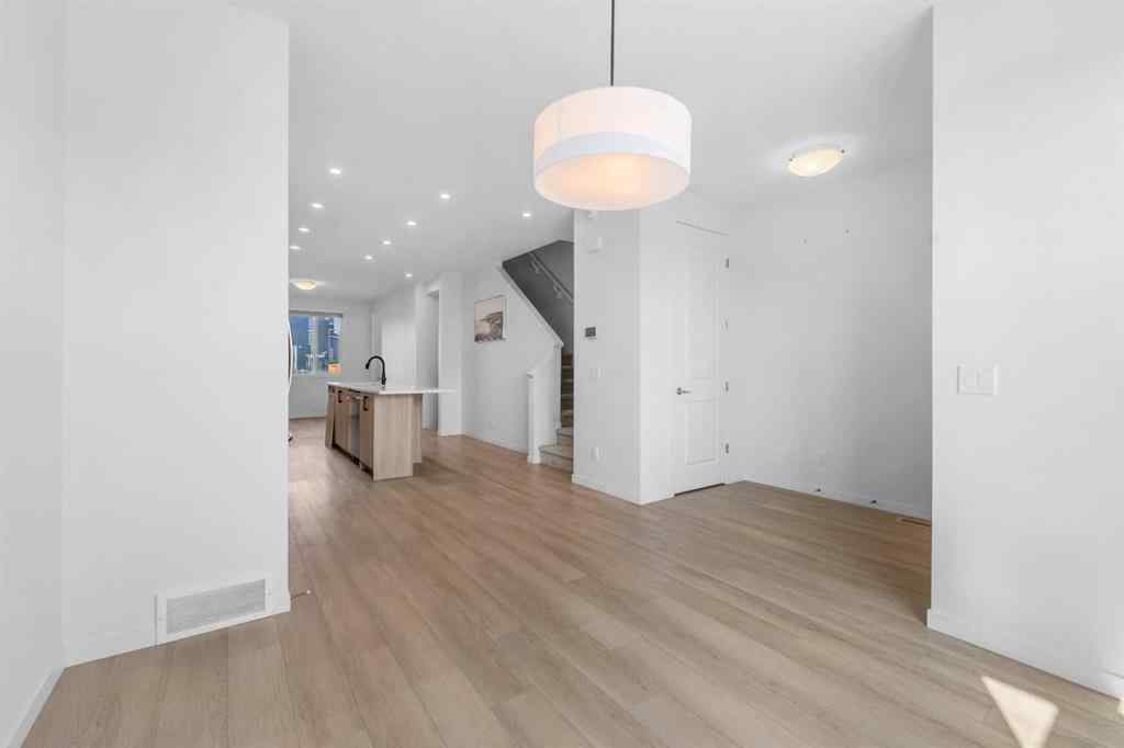 MLS® A2257638 - 21 Edith Gate NW in Glacier Ridge Calgary, Residential