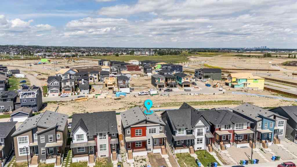 MLS® A2257663 - 61 Belmont Drive SW in Belmont Calgary, Residential