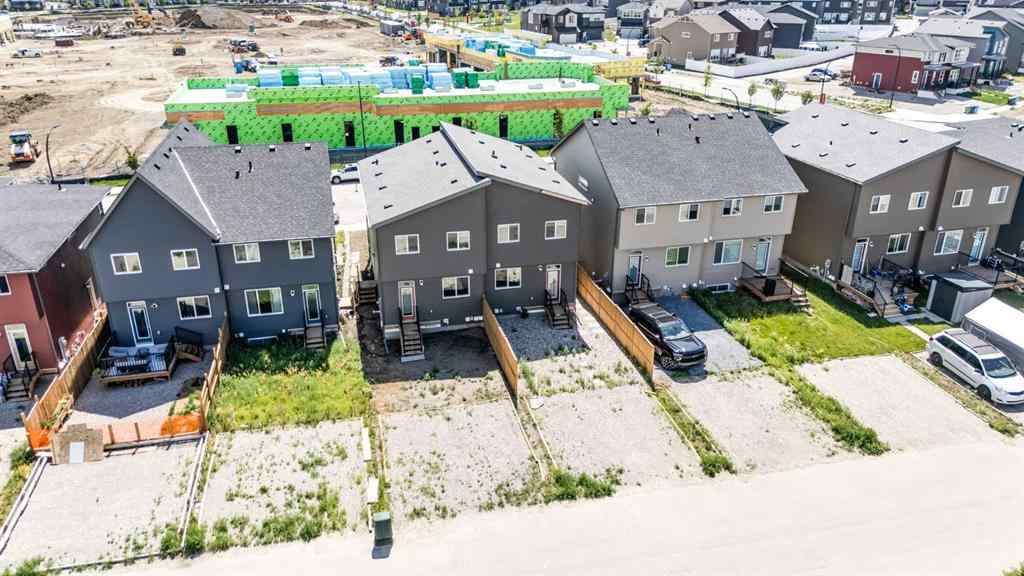 MLS® A2257663 - 61 Belmont Drive SW in Belmont Calgary, Residential