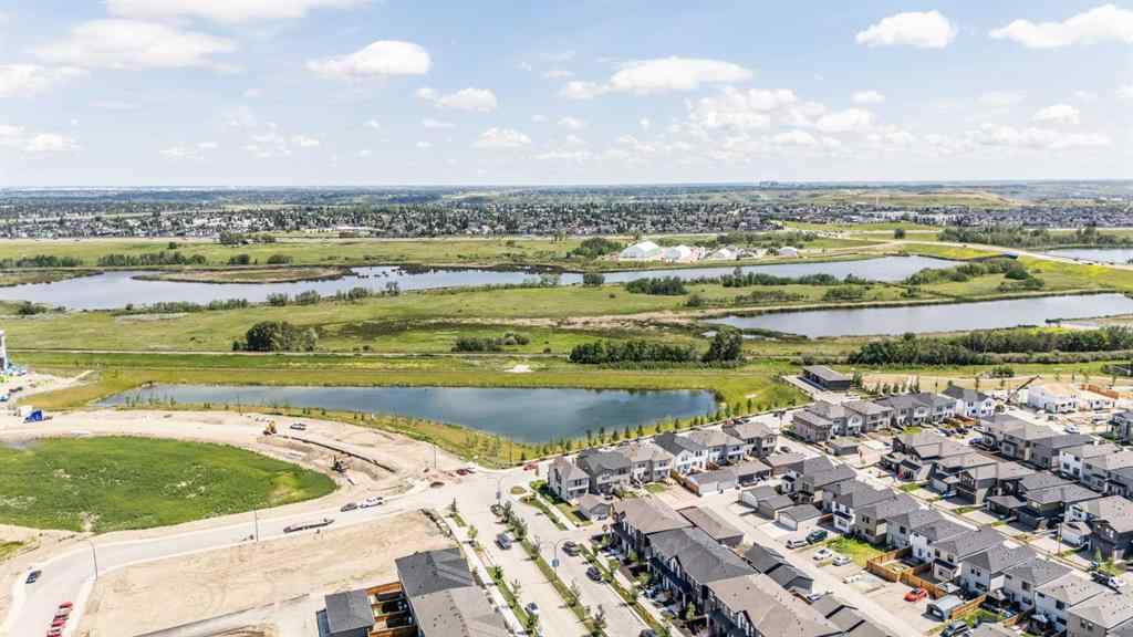 MLS® A2257663 - 61 Belmont Drive SW in Belmont Calgary, Residential