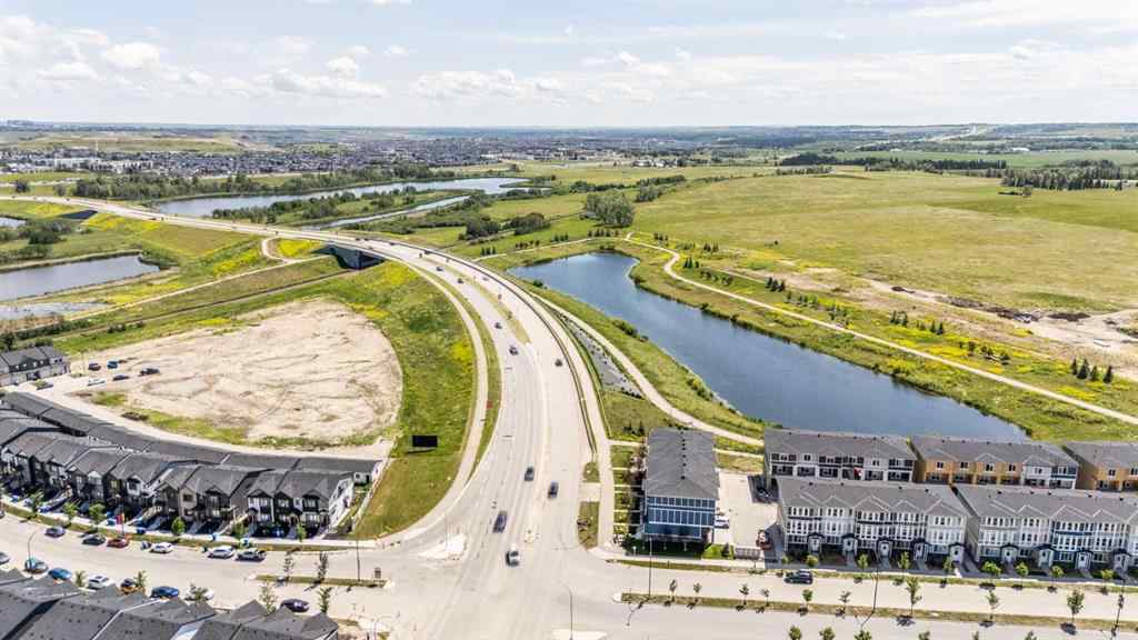 MLS® A2257663 - 61 Belmont Drive SW in Belmont Calgary, Residential