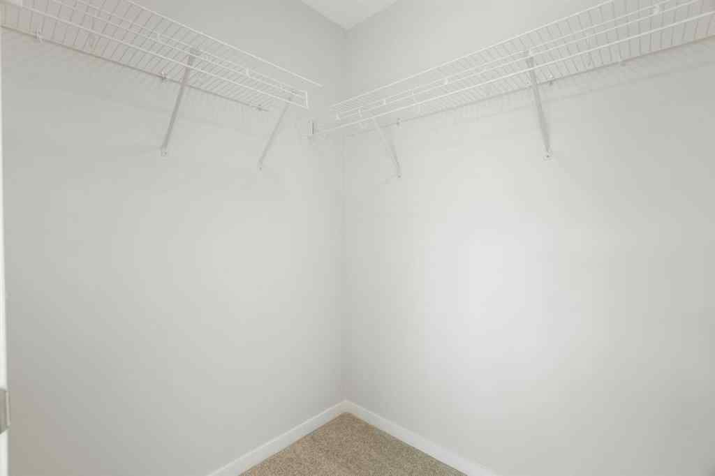 MLS® A2257737 - 34 Herron Common NE in Livingston Calgary, Residential