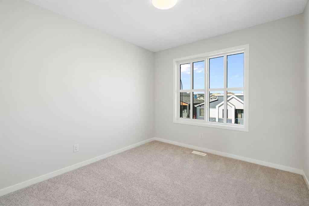 MLS® A2257737 - 34 Herron Common NE in Livingston Calgary, Residential