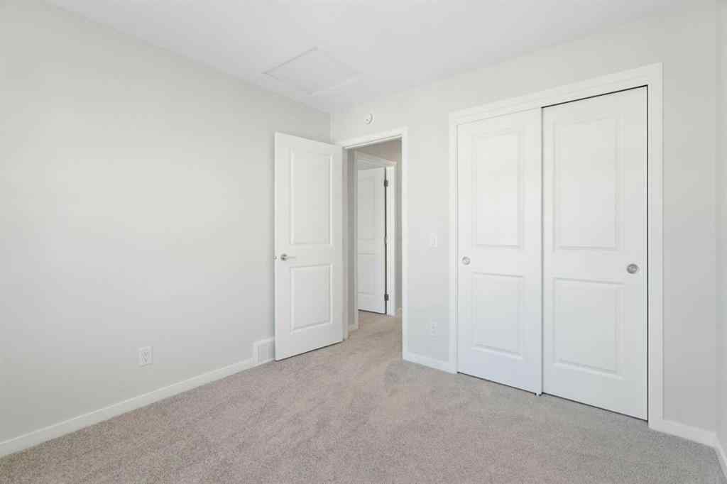 MLS® A2257737 - 34 Herron Common NE in Livingston Calgary, Residential